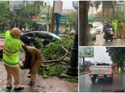 Nghệ An: Hình ảnh đẹp CSGT dọn cành cây đổ chắn lối đi ngày cá tháng Tư