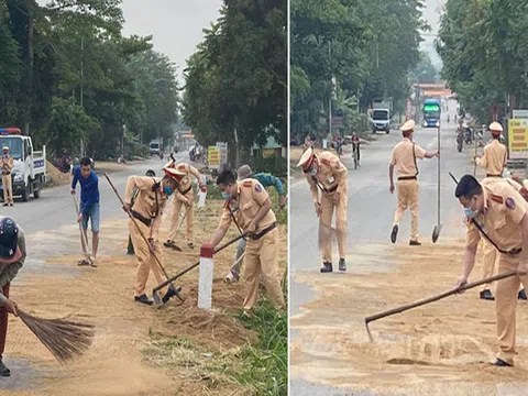 Hình ảnh đẹp chiến sỹ CSGT Nghệ An cùng người dân dọn cát sỏi rơi vãi trên đường