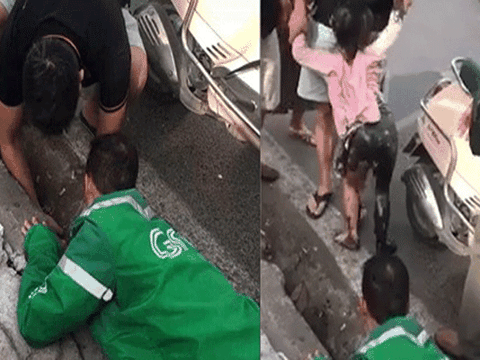 Nghẹt thở khoảnh khắc người dân giải cứu bé gái bị ngã lọt xuống khe cống