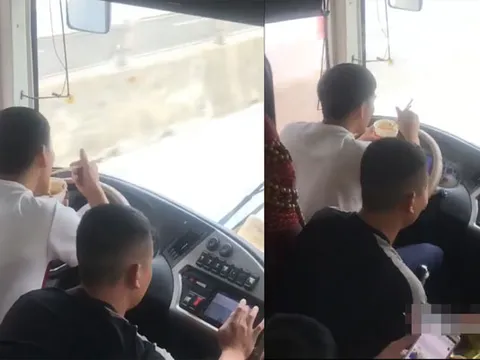 Tài xế xe giường nằm ở Nghệ An vừa lái vừa ăn mì tôm