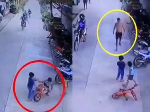 Con trai chơi xe đạp bị đẩy ngã, bố lập tức đấm thẳng vào đầu bạn của con khiến dân tình phẫn nộ